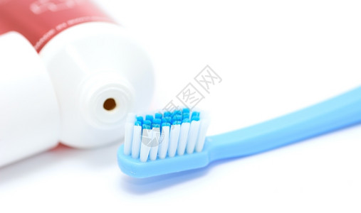 牙刷和牙膏背景图片