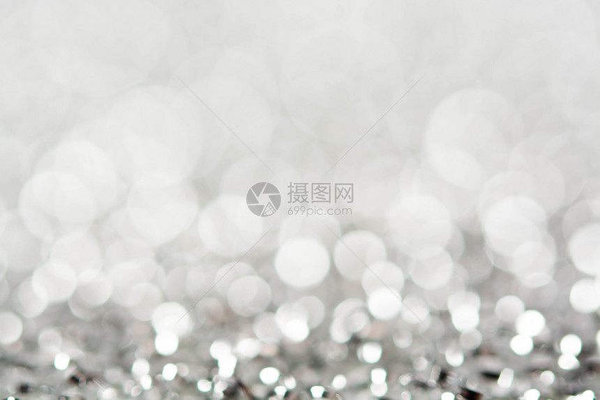 抽象的银色白布OKh灯光背景火花闪亮的庆典图片