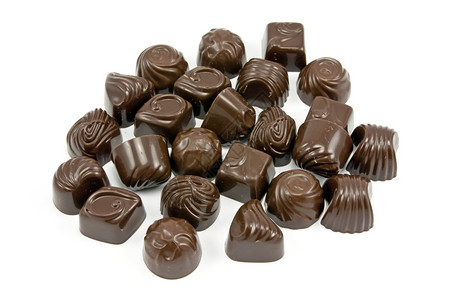 果仁糖甜点白色背景的黑各种深巧克力瓜碱装饰背景图片