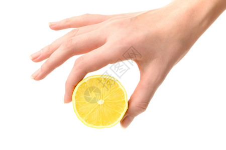 新鲜的柑橘女食物手握柠檬与白种背景隔绝酸的图片