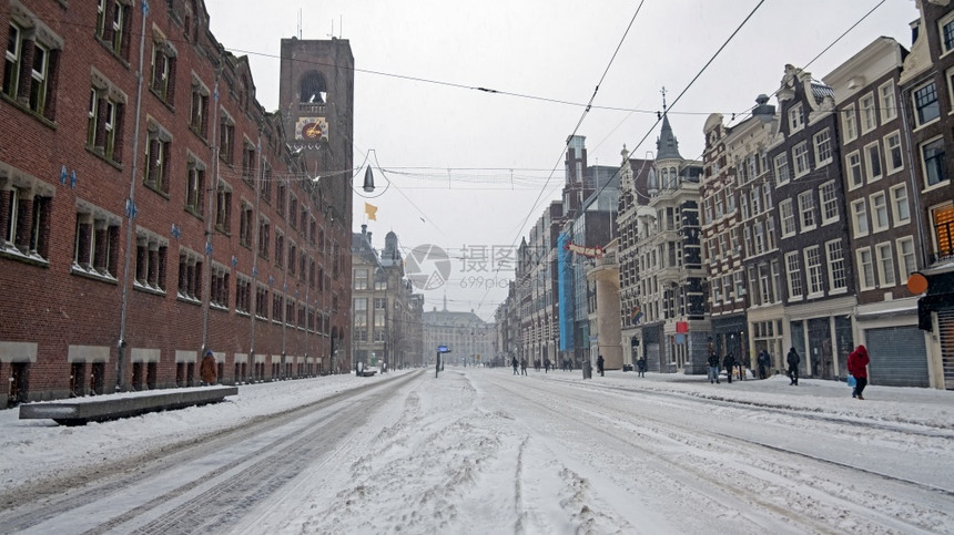 城市运输荷兰冬季DamrakDamrak的雪市阿姆斯特丹旅行图片