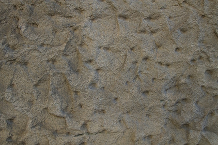 风化泥石墙背景或岩砂的纹理土石墙的背景肮脏灰色背景图片