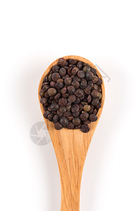 质地木勺中的棕色有机扁豆白底孤立于豆类干燥图片
