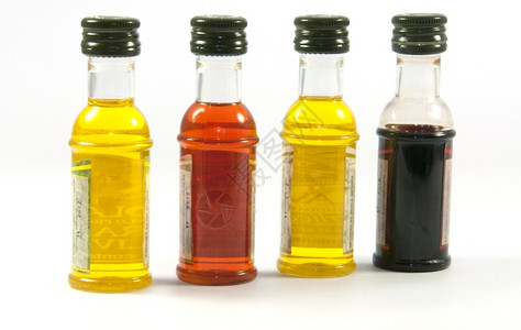插图用不同品味的橄榄油瓶子季节素食主义者图片