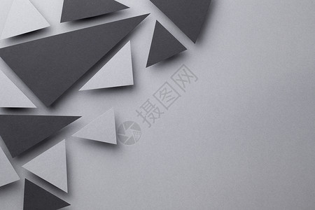 灰色几何形状最佳灰色纸背景上具有黑色和灰三角形状的抽象背景最小样式复制空间顶视图黑色的抽象背景
