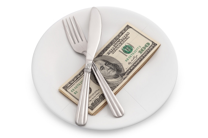 管理白背景的叉子和刀在盘上的美元钞票支付现金图片