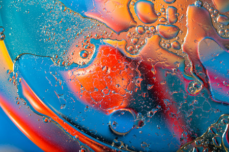 抽象的油滴饱和颜色抽象背景油滴饱和颜色的抽象背景湿绿色图片