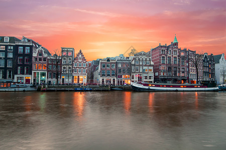 在荷兰日落时阿姆斯特丹河户外运输风景优美图片