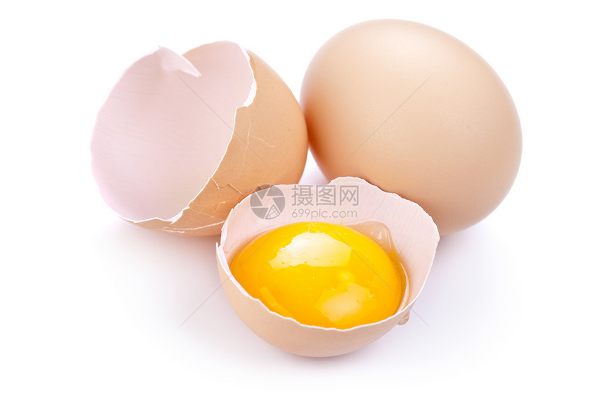 白色背景的鸡蛋黄和壳图片