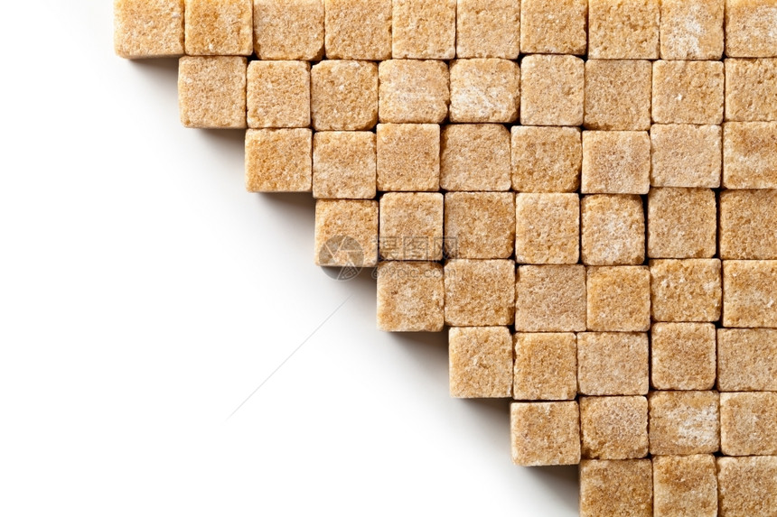 白色背景上的棕糖块复制空间顶视图白色的水平团体图片