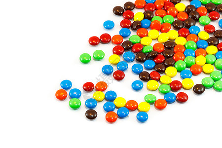 米一大堆多彩的巧克力涂着糖果白色的甜点图片