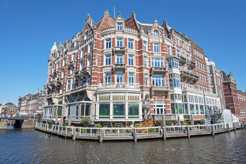 旅游目的地荷兰阿姆斯特丹的中世纪建筑大楼家图片
