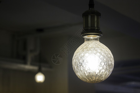 高效的电灯泡最起码房间风格的灯泡设计库存照片点亮图片