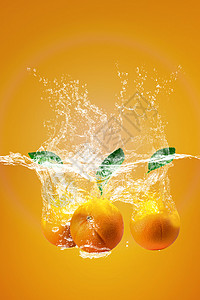 泼水的素材湿的在橙子和茶叶上泼水清新夏季概念爽饮食设计图片