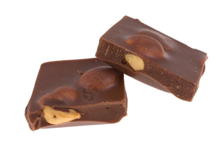 吃品尝巧克力和坚果在孤立的细节图片