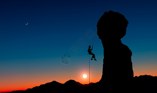 爬上山顶安全一个登山者在日落时爬上山后独自从一个岩峰上飞来攀登顶背景