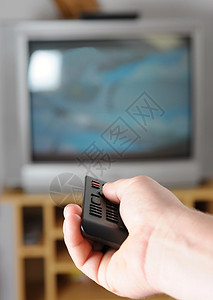娱乐按与电视遥控器手牵改变电视频道保持图片