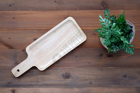 旧木本底的空板食品展出蒙戴厨房用具服务小样空白的背景图片