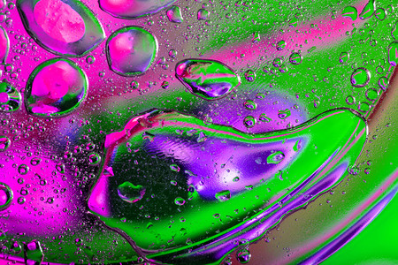 紫色和粉红调油滴的抽象背景紫色和粉红调油滴的抽象背景自然的图片