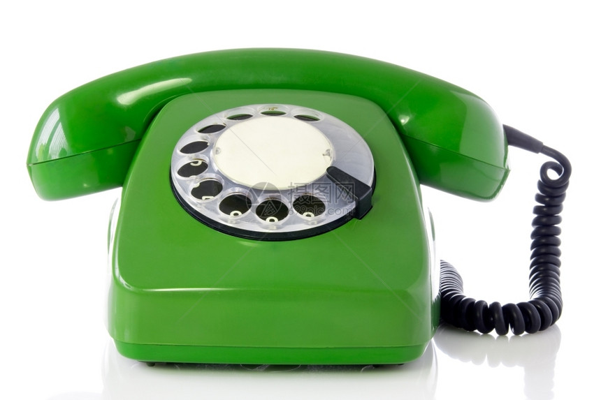 白色背景上孤立的绿色复古电话的目老图片