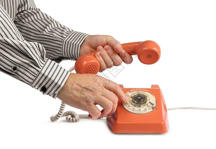 男用古老的电话男手打在白色上与世隔绝讲话接触称呼图片