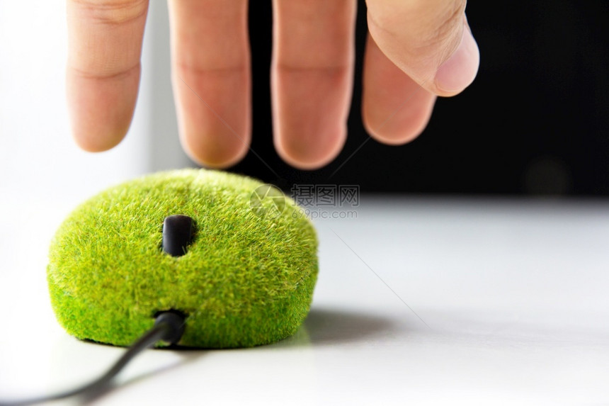 创新绿色计算机鼠概念力量手图片