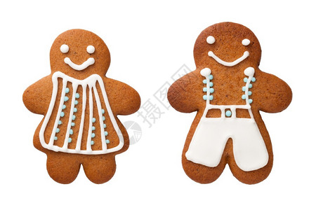 生姜女士和男形状的姜饼干在白色背景中被隔绝在传统的图片