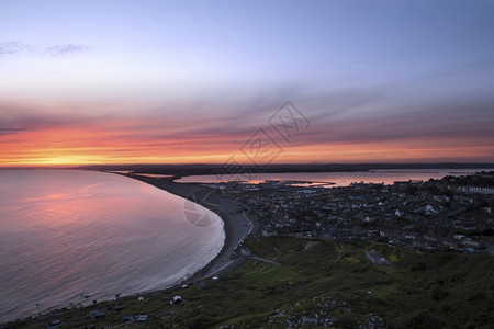 Chesil海滩日落太阳欧洲韦茅斯图片