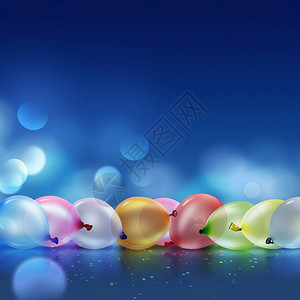 庆祝蓝色背景模糊的彩气球喜悦周年纪念日图片