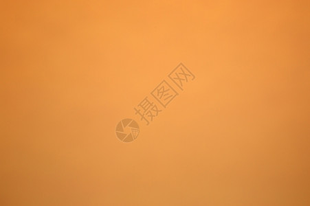 纸板的橙色表面光滑而微妙用于背景精美的黄色抽象背景图片
