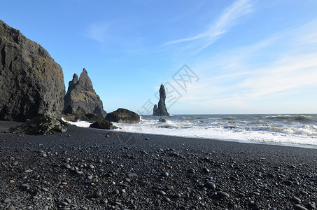 雷尼斯法拉大西洋冰岛南部维克Reynisfjara海滩沿岸的堆栈背景