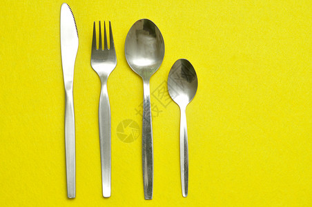 厨房食物餐厅刀叉茶匙和甜点勺背景图片