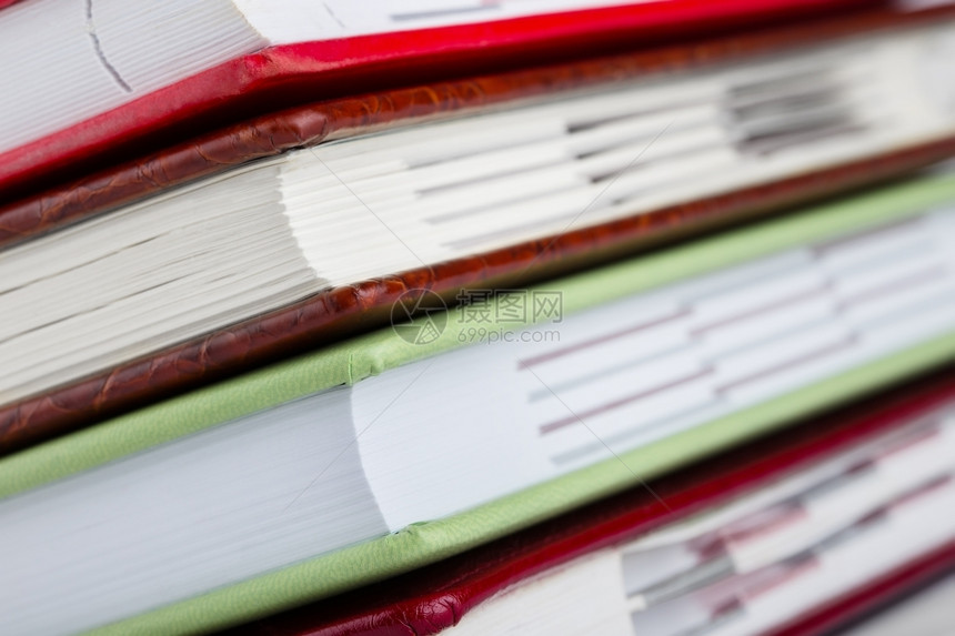 可选择的商业用焦点拍摄的一堆日记详细内容堆叠日记的详细内容组织者图片