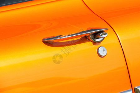 油漆工作金属橙色汽车门板格合杠杆控制图片