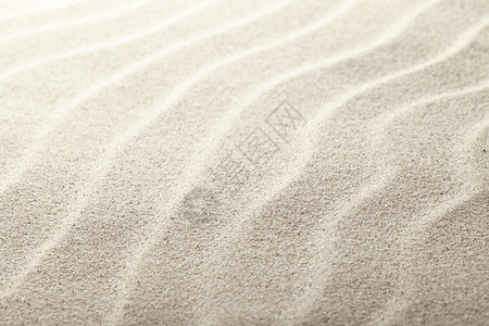 富劳卡有质感的海滩沙作为背景近视粗糙的图片