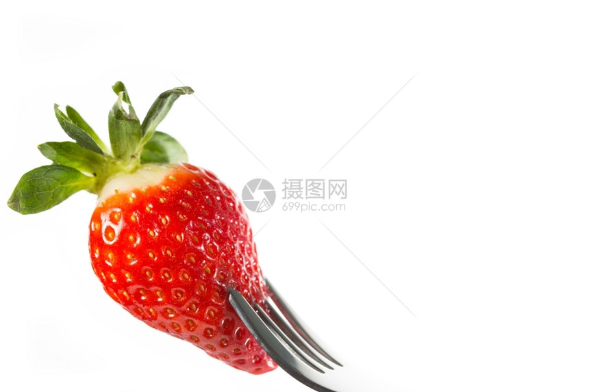 糖草莓季节卡在叉子上红色的小吃图片