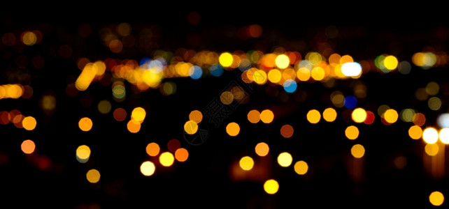 夜里城市的灯光昏暗模糊黑的红色图片