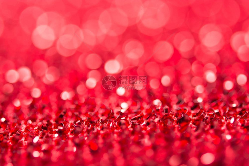 红色bokoh节日的圣诞装饰背景闪亮的辉光图片