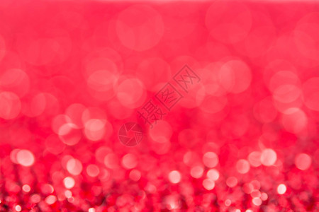 闪发光热情假期红色bokoh节日的圣诞装饰背景图片