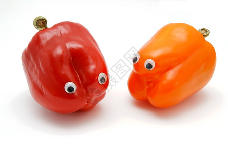 美味的两只甜胡椒眼睛被隔绝新鲜的玩笑图片