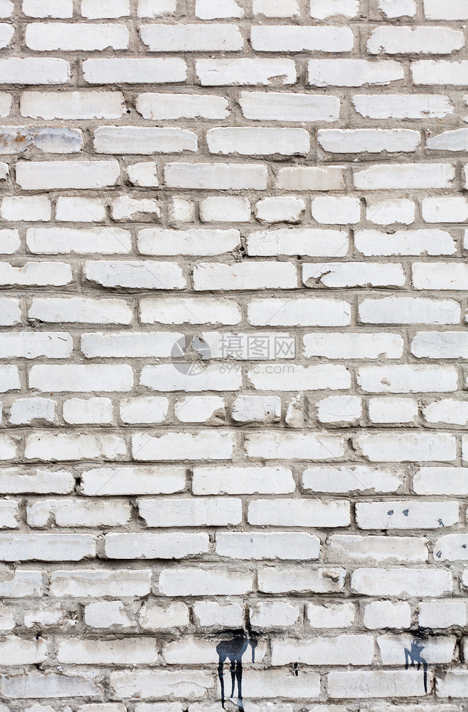 白格砖墙壁背景水平的正面石工图片