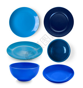 闪亮的空白色背景上蓝盘子和碗陶器图片
