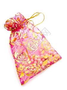 粉红色礼品袋中的珍珠白底包装饰风格财富图片