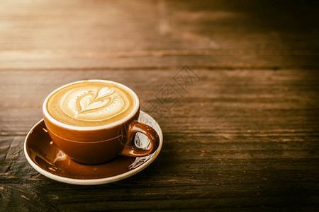 香气软聚焦于拿铁咖啡杯古董效果过程图片早餐浓咖啡图片