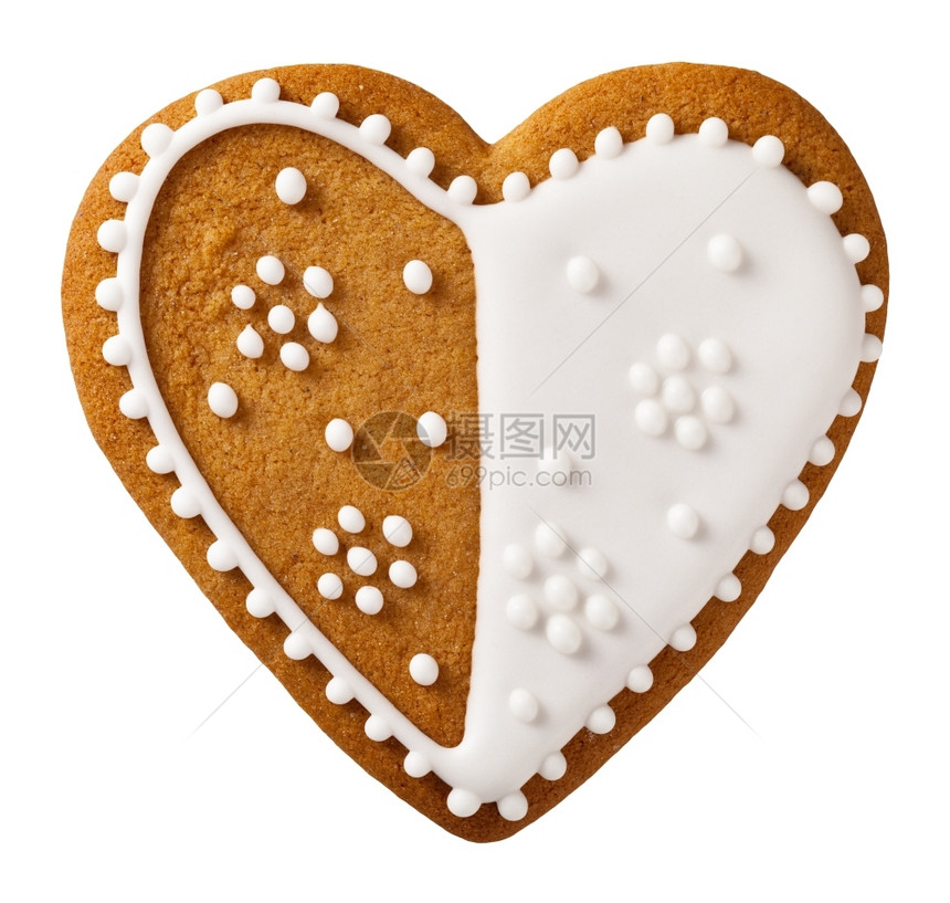 假期圣诞姜饼在白背景心脏形状上与世隔绝象征传统的图片