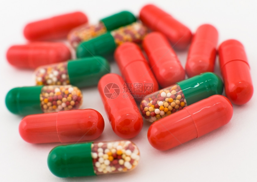 场地口述大型药品红胶囊和绿丸图片