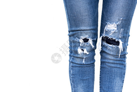 女孩年轻的魔法特写女人腿在白色背景上穿牛仔裤图片