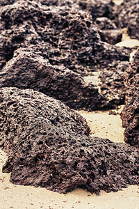 户外泰国岸边的岩石和沙子封闭起来卵石地质学图片