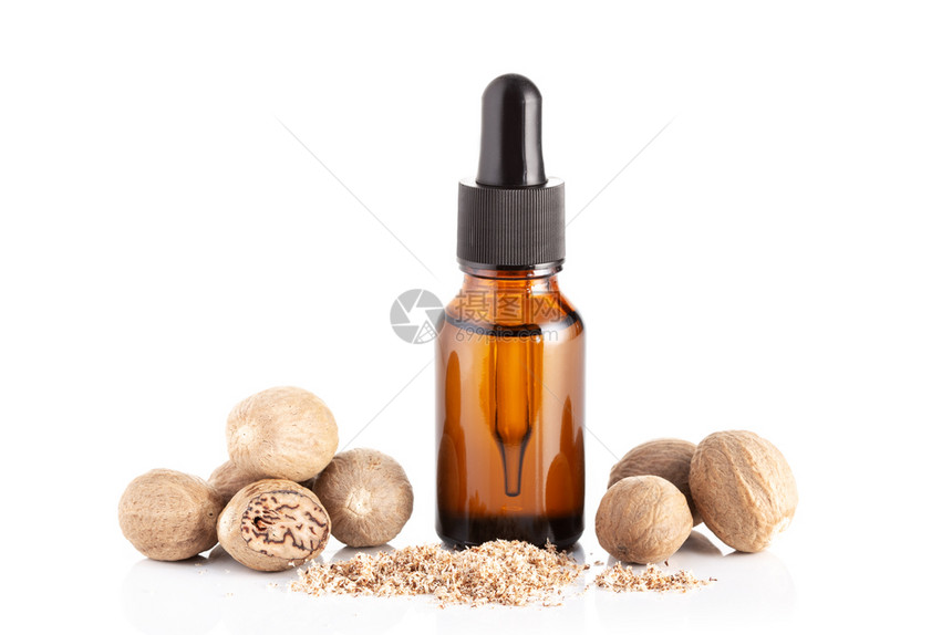 香基本的化妆品白底色孤立的Nutmeg基本油类用于按摩的Nutmeg油类图片