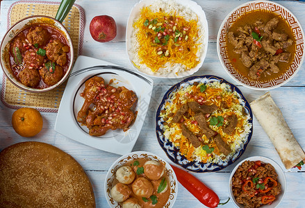 劳伦蒂乌阿查里富汗乌辛中亚各式传统菜盘顶视等放沙洛背景